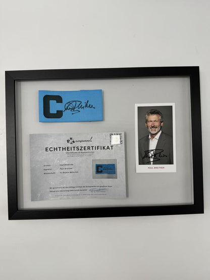 Kapitänsbinde Paul Breitner signiert im Rahmen Bayern München Fußball Autogramm