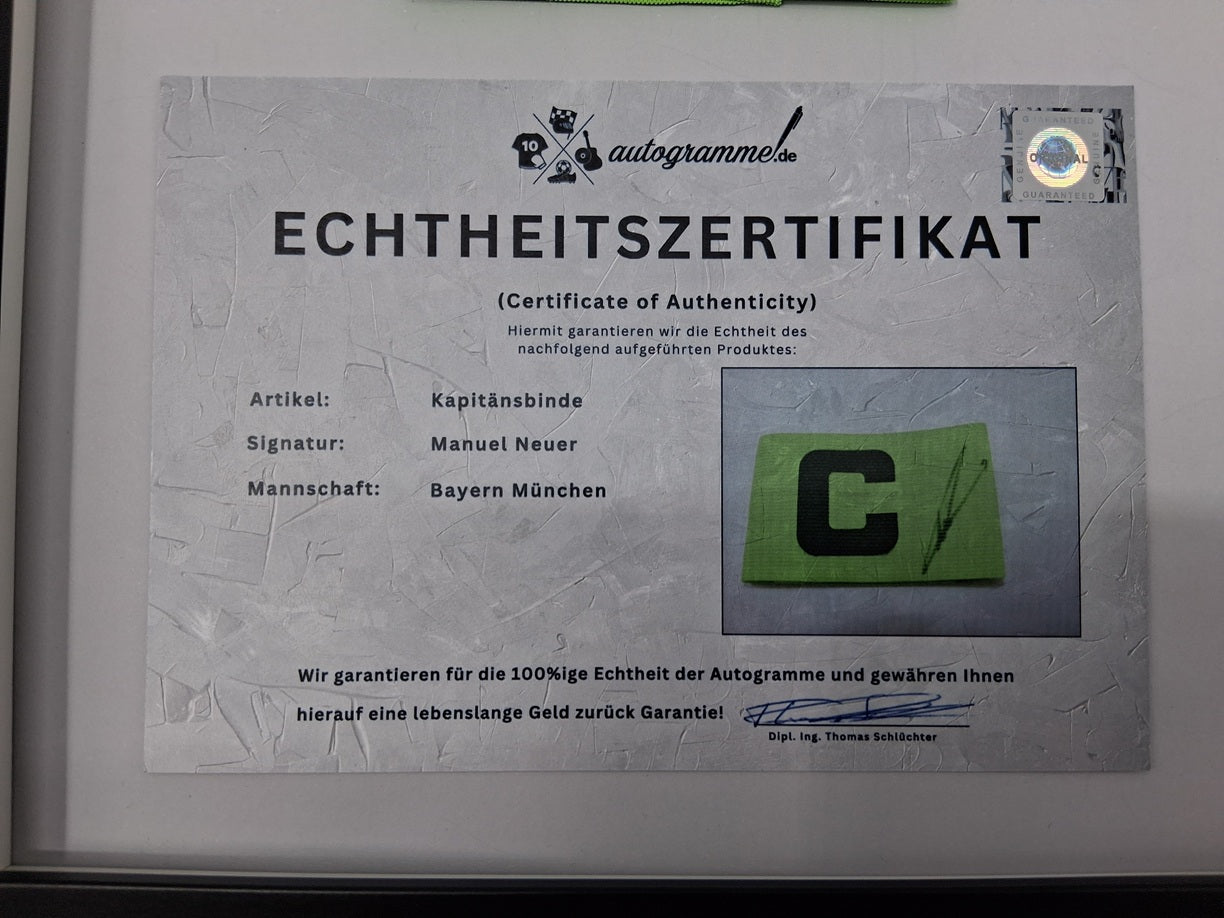 Captain's armband signed by Manuel Neuer as part of a Bayern Munich football autograph