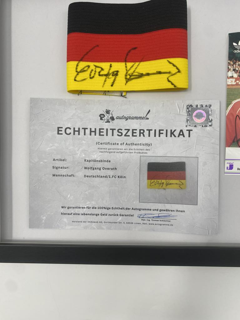 Kapitänsbinde Wolfgang Overath signiert im Rahmen Deutschland/1.FC Köln COA