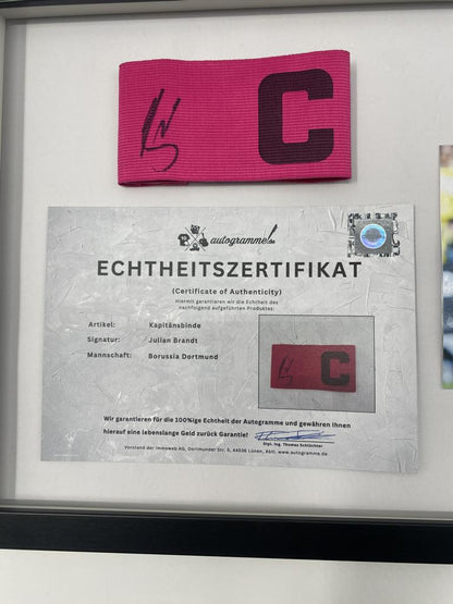 Captain's armband signed by Julian Brandt as part of the Borussia Dortmund COA football campaign