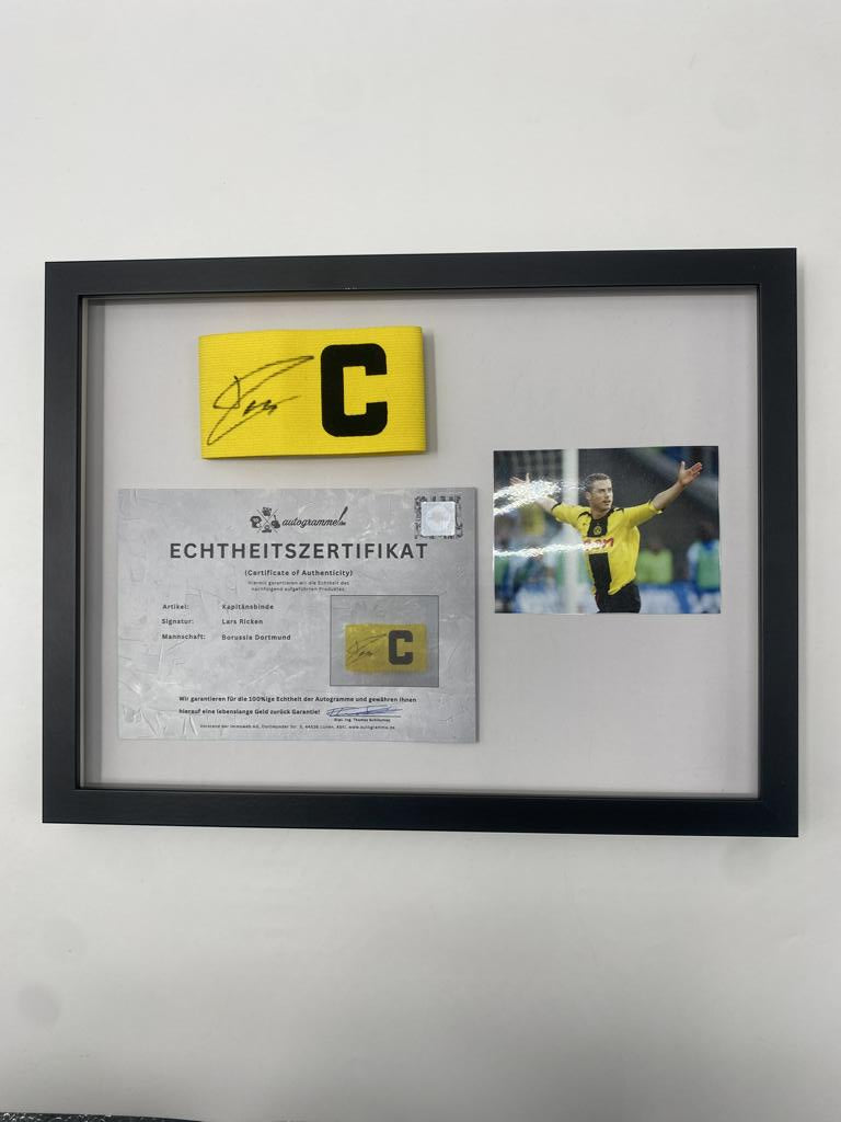 Captain's armband signed by Lars Ricken as part of the Borussia Dortmund COA