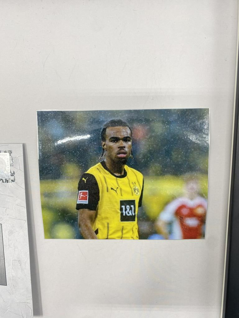 Captain's armband signed by Carney Chukwuemeka in a Borussia Dortmund autograph frame