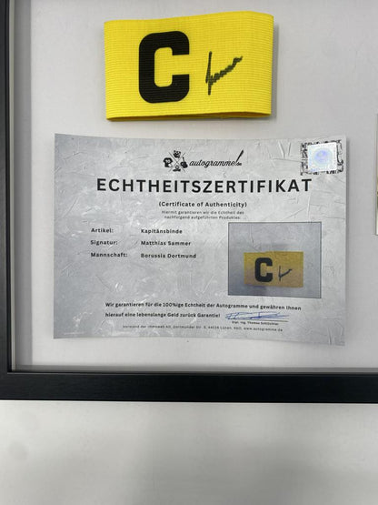 Kapitänsbinde Matthias Sammer signiert im Rahmen Borussia Dortmund COA