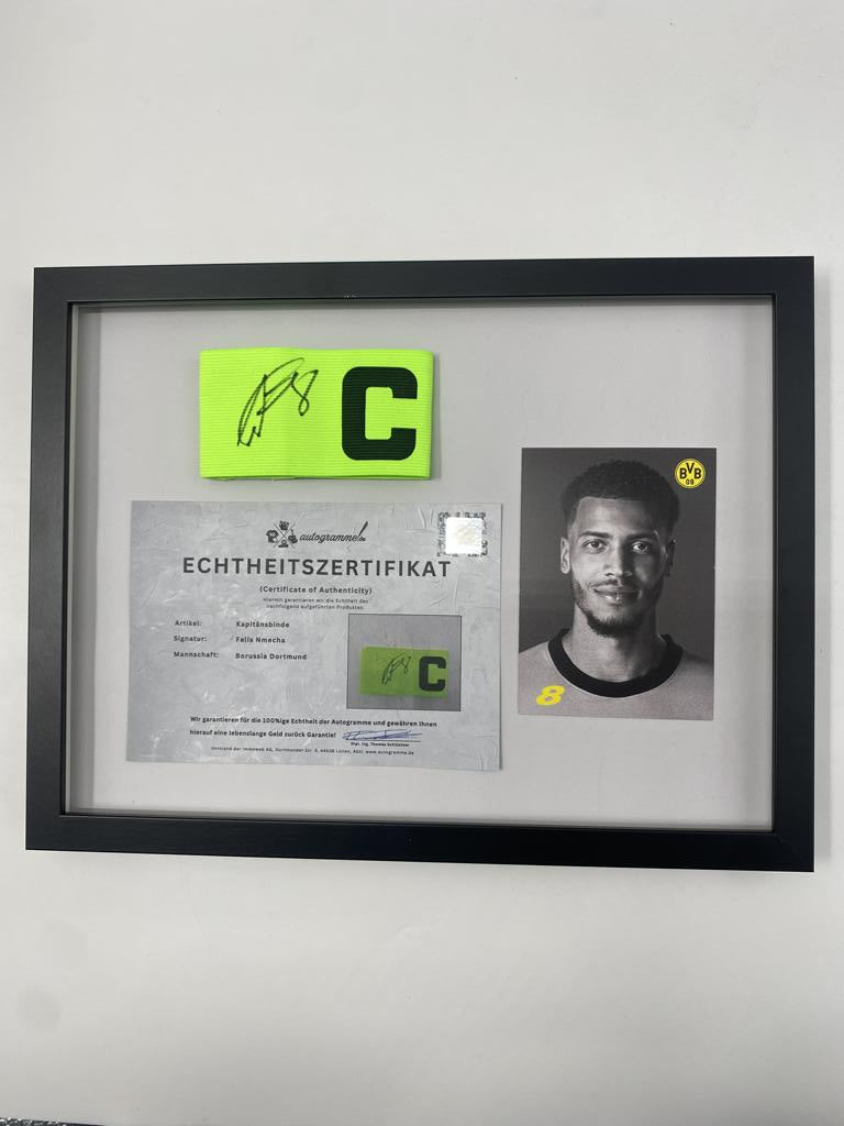 Captain's armband signed by Felix Nmecha as part of the Borussia Dortmund COA